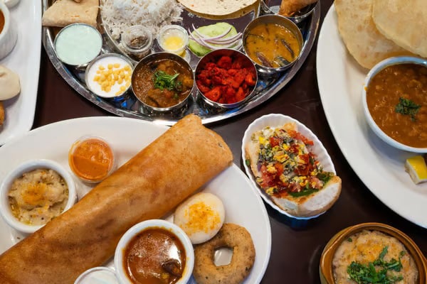 Variety of Indian dishes on plates
